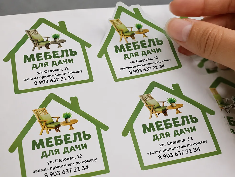 Фигурные зелёно-белые наклейки для мебельной компании с логотипом и надписями